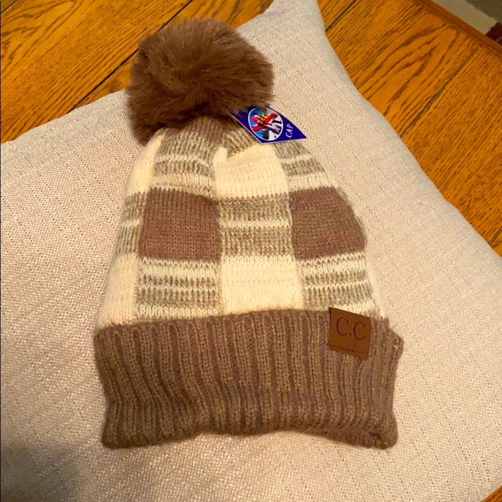 Brown and cream patterned CC beanie with Pom.